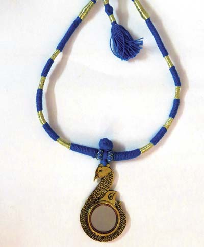 Necklace made with the traditional Aranmula mirror  of Kerala