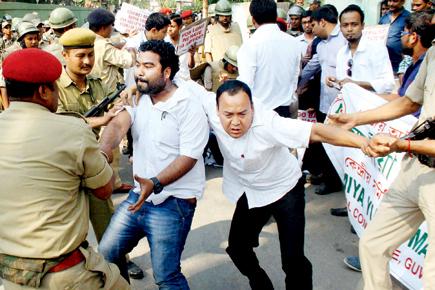 Protests erupt in Assam; CM Gogoi blames CSF for attack 