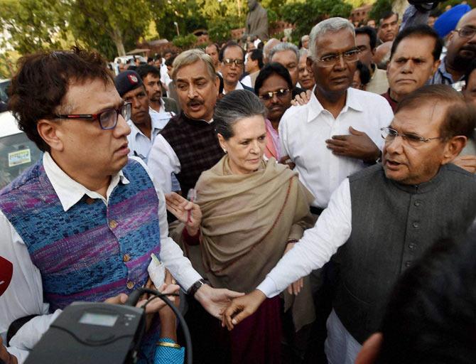 Congress chief Sonia Gandhi, JD-U President Sharad Yadav and other opposition leaders during a march from Parliament to Rashtrapati Bhavan in New Delhi on Tuesday in a show of strength and solidarity against the controversial Land Acquisition Bill 