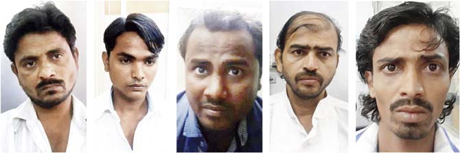 (From left) Tahir Noor Sheikh (27), Zakirhussain Samsuddin Sheikh (31), Zahid Sheikh (24), Abdul Latif Sayyed (41), and Rajesh Durge (42), the accused members of the car spark gang