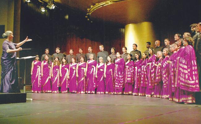 The Paranjoti Academy Chorus at a performance with (left) Coomi Wadia 