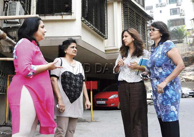 Residents (from l) Madhu G, Vaishali T, Kashish A and Neerja S say the tension and worry is palpable