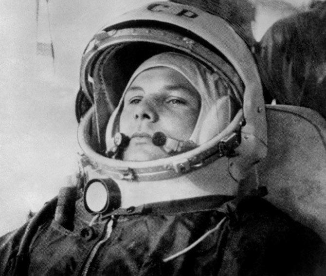 Yuri Gagarin, 27, (1934-68) wearing cosmonaut helmet, prepares to board Soviet Vostok I spaceship 12 April 1961 at Baikonur rockets launch pad shortly before its take-off. Pic/AFP