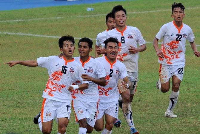 Bhutan footballers celebrate their win