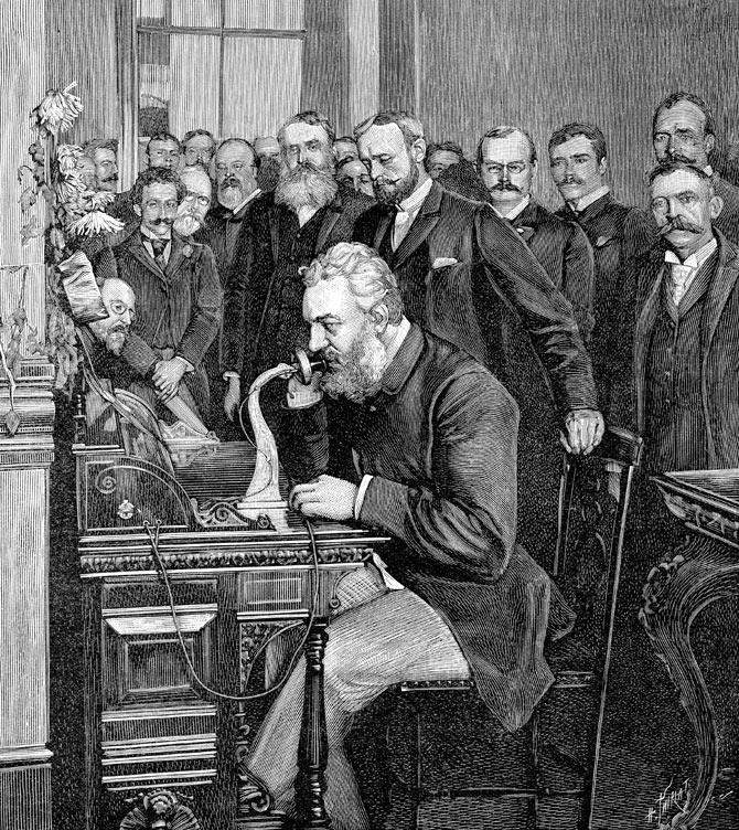 An illustration of Alexander Graham Bell at the opening of the long-distance line from New York to Chicago in 1892