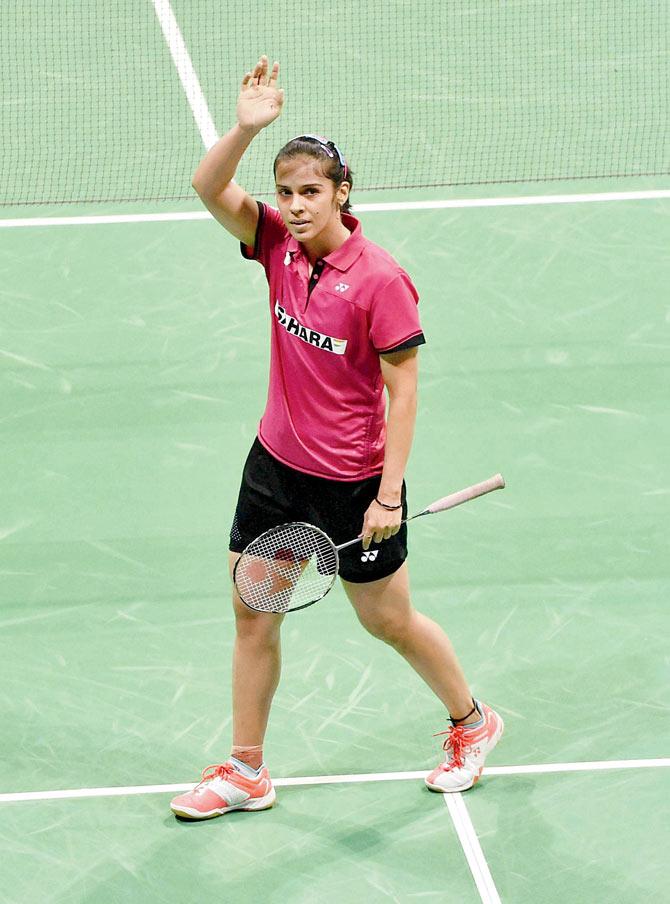Saina Nehwal waves to the crowd after beating Yui Hashimoto in New Delhi on Saturday. PIC/PTI