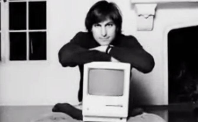 An undated image of a young Steve Jobs posing with an Apple Macintosh. Pic/YouTube