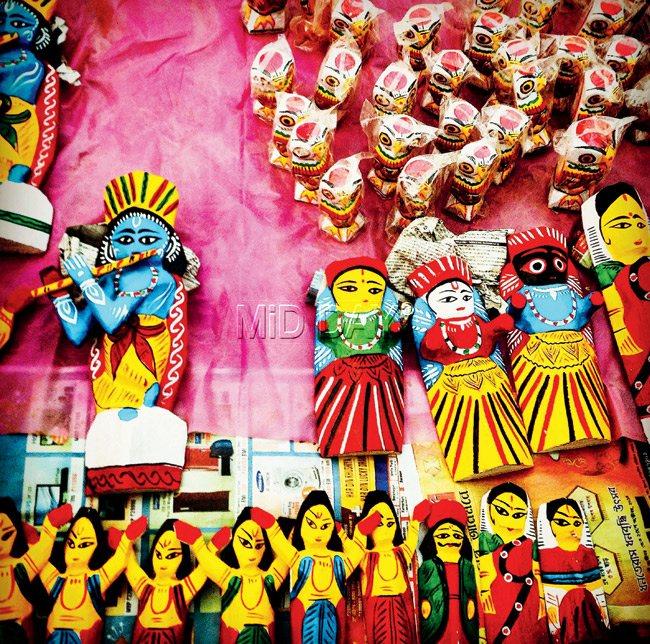 Wooden, hand-painted dolls sold at the Khoai Mela