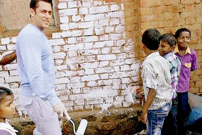 Salman Khan paints a house in a Karjat village while shooting for a film