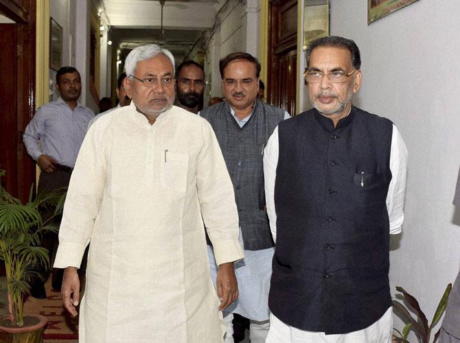 Bihar Chief Minister Nitish Kumar, Union Agriculture Minister Radha Mohan and Chemical and Fertilizer Minister Ananth Kumar after a meeting on earthquake and cyclone damages, in Patna on Wednesday.