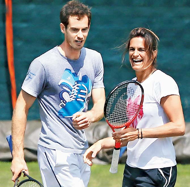 Andy Murray and Amelie Mauresmo during a practice session in London last year. Pics/Getty Images