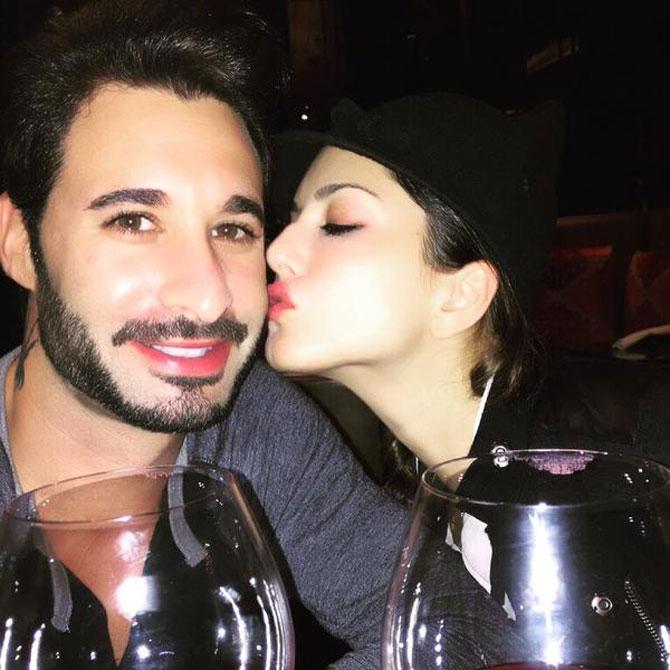 Sunny Leone kisses her husband Daniel Weber during the surprise birthday dinner. Picture courtesy: Sunny