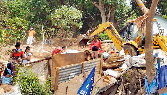 Two bulldozers were used to raze the shantytown that had sprung up near Unit 32, as well as an illegal toddy den in the area 