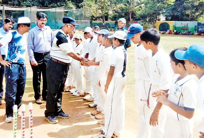 Former Mumbai Ranji Trophy player Sankaran Srinivasan interacts with youngsters at Matunga yesterday