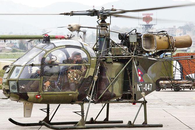 The Nepalese army chopper that spotted the wreckage of the US Marine helicopter in Kathmandu, Nepal. pic/ap