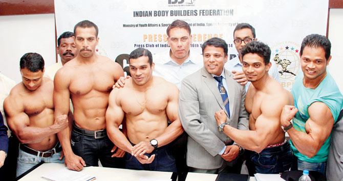 Beefcakes not banned yet: Chetan Pathare(in a suit) at the Indian Body Builders Federation. PIC/SAMEER MARKANDE 
