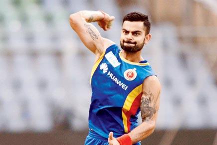 Livid over rain, Virat Kohli argues with umpire Dharmasena