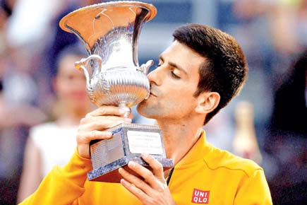 Novak Djokovic brushes aside Roger Federer to win Rome title