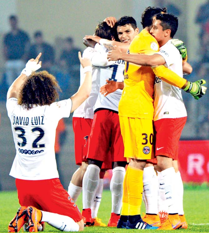 PSG players celebrate after beating Montpellier at the La Mosson Stadium. Pic/AFP