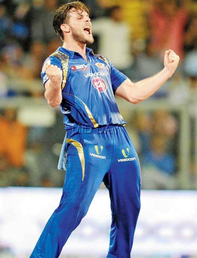 Mitchell McClenaghan celebrates the wicket of SRH