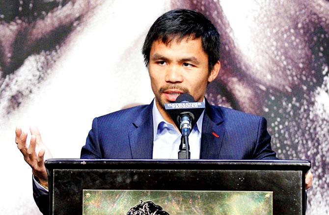 Manny Pacquiao speaks during a news conference at MGM Grand Hotel & Casino in Las Vegas yesterday. Pic/AFP