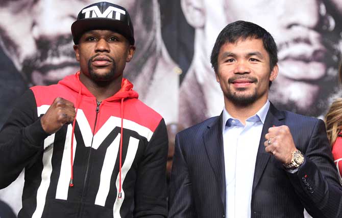 Floyd Mayweather Jr and Manny Pacquiao. Pic/AFP