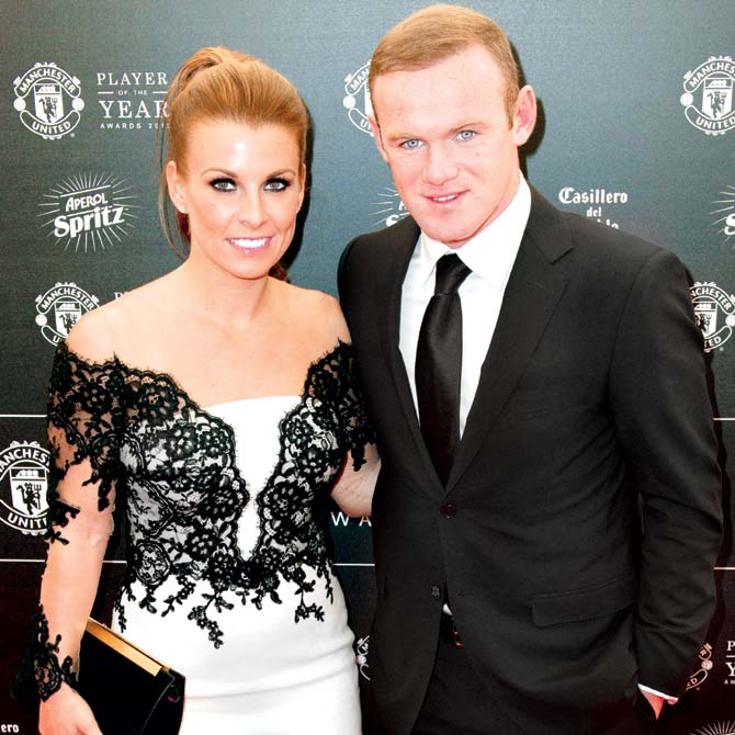 Skipper Wayne Rooney and wife Coleen