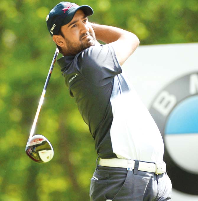Shiv Kapur tees off during Day 1 of the BMW PGA Championship
