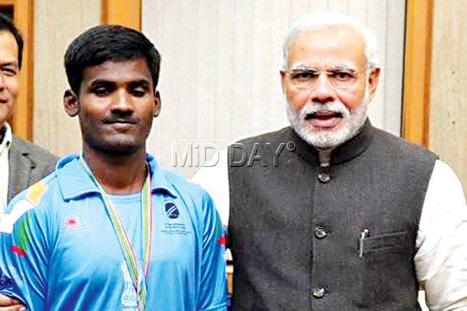  Karche being felicitated by Prime Minister Narendra Modi after the T20 World Cup triumph in December. File pic