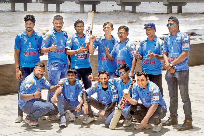 India’s England-bound blind team pose at the Worli end of the Sea Link in Mumbai yesterday. PIC/PRADEEP DHIVAR 