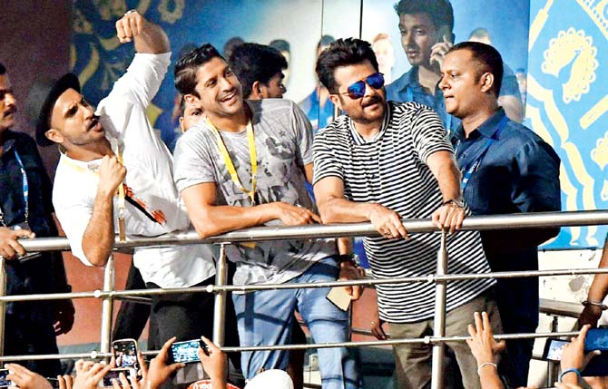 Bollywood actors Anil Kapoor, Farhan Akhtar and Ranveer Singh at Eden Gardens yesterday for the IPL-8 finale. Pic/PTI