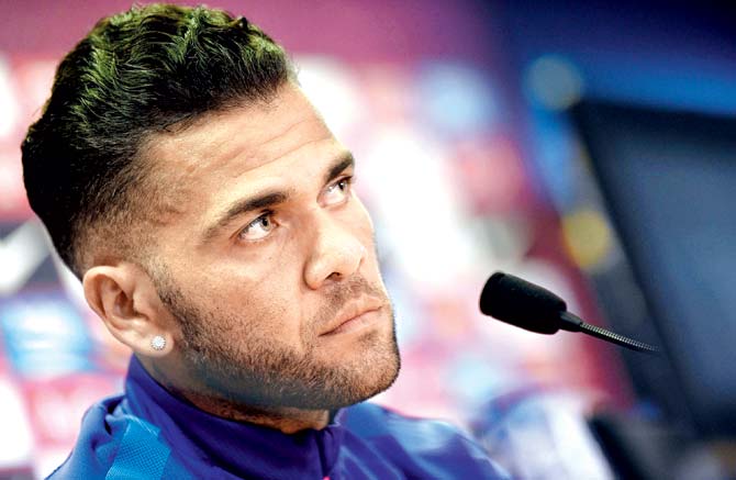 Dani Alves at a press conference near Barcelona yesterday
