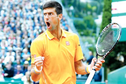 French Open: Djokovic cruises, Dimitrov loses