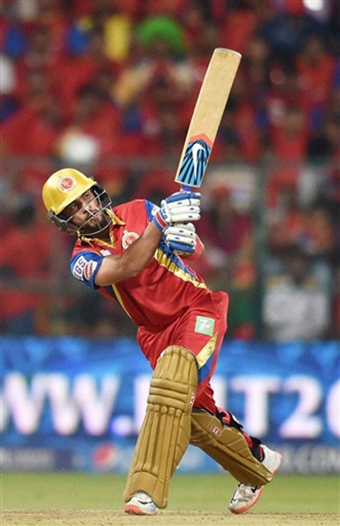 Mandeep Singh leads RCB to a 7-wicket win over KKR in rain-hit match