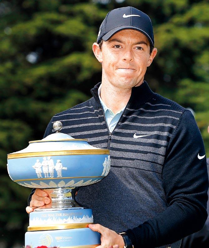Rory McIlroy lifts the Walter Hagen Cup at TPC Harding Park on Sunday. Pic/AFP