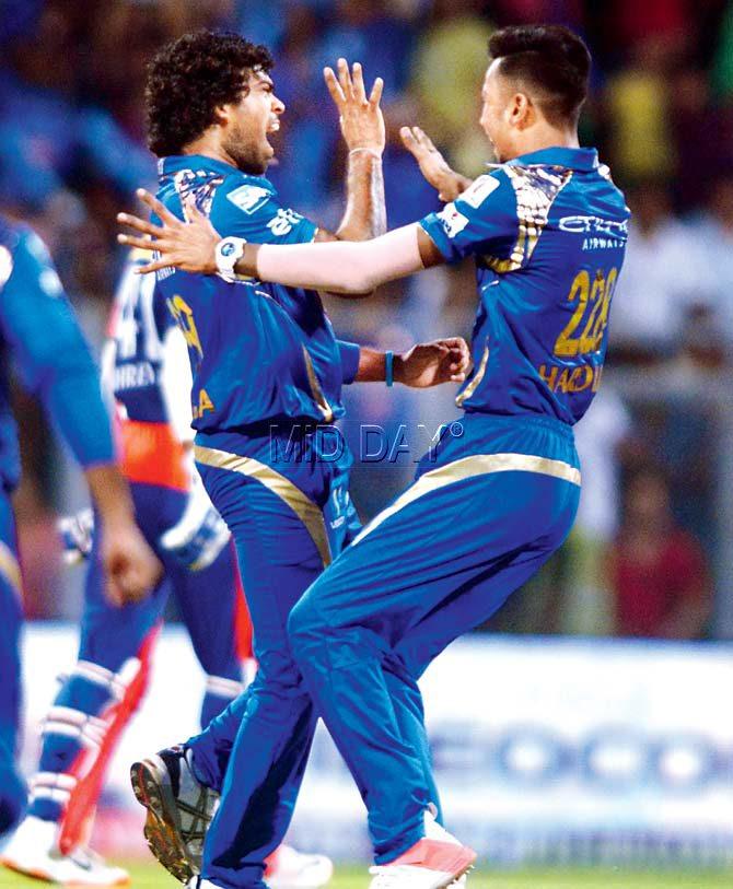 Lasith Malinga (left) celebrates a Delhi Daredevils wicket on Tuesday. Pic/Atul Kamble 