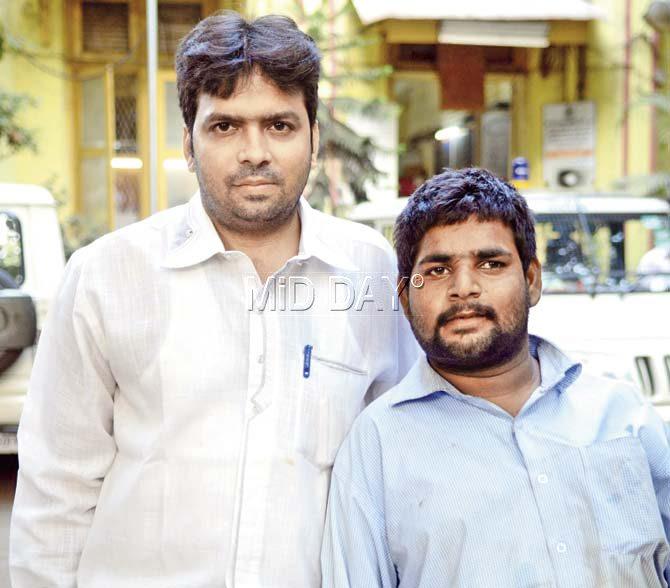 Afzal Dawoodani (left), a tailor from Dongri, fed Rahul Jagdish, sent him for a bath, gave him a fresh set of clothes and took him to the J J Marg police. Jagdish has been under the care of the police for nearly a week. Pic/Bipin Kokate