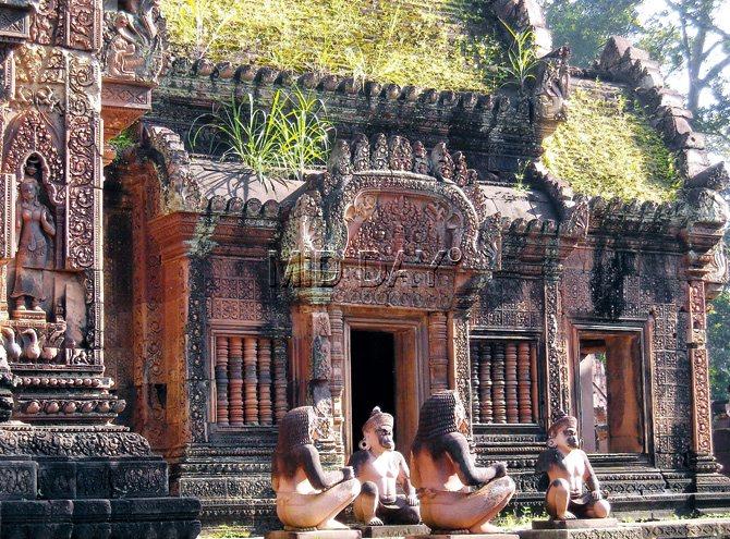 Bantey Srei at the outskirts of the main site offers a stunning display of carvings that include Shiva as well as the vanar sena (in pic). It is home to miniature versions influenced from architecture of several Angkor temples.