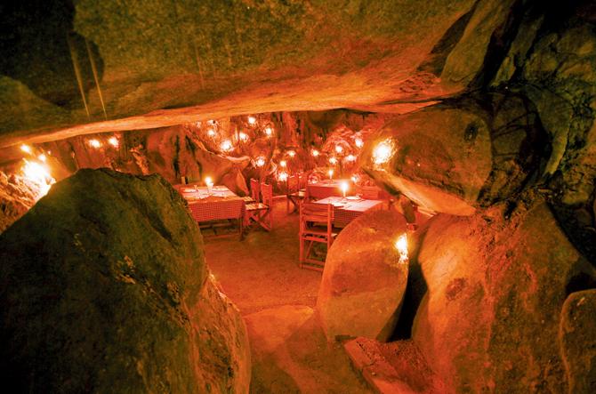 Candle-lit dinner in a natural cave at Edakkal Hermitage