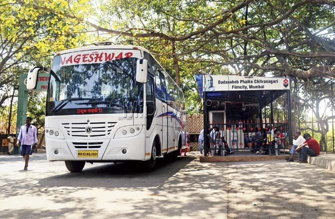 The bus is set to take tourists for the Filmcity tour at the main gate
