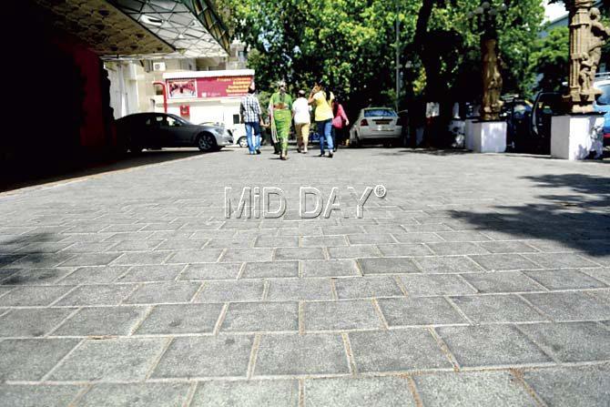 The newly revamped footpath outside Churchgate station and Hotel Ambassador. (Left) Bollards on the path prevent vehicles from being parked. Pics/Bipin Kokate