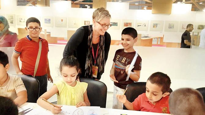 Sara Tyson, Canadian illustrator and graphic designer conducting an art workshop at the SCRF. Incidentally, Tyson served on the Festival jury last year