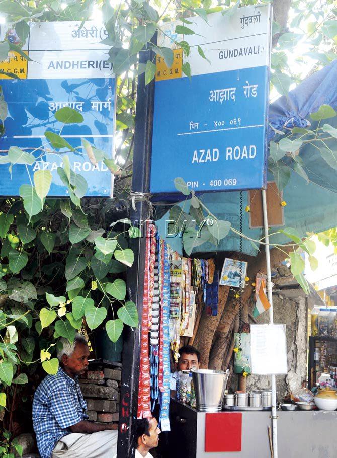 The old correct signboard showing Azad Road in Andheri, while the new sign has moved it to Gundavali, which is a couple of kilometres from the spot. Pics/Nimesh Dave