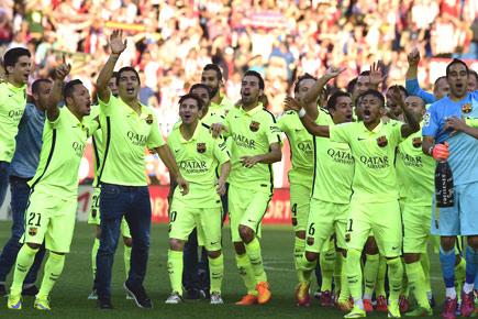 Lionel Messi leads Barcelona to their 23rd La Liga title