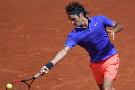 French Open: Federer, Wawrinka advance to third round