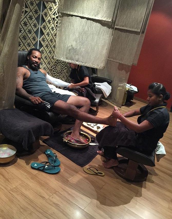 Chris Gayle being treated at a Spa