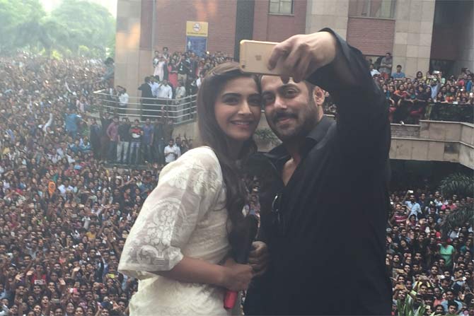 Sonam Kapoor and Salman Khan taking selfie with fans in Noida