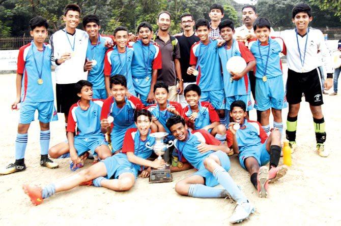 Don Bosco (Matunga) U-14 side pose with the trophy after winning the Utpal Sanghvi knockout inter-school football title at Azad Maidan yesterday. Pic/Suresh KK 