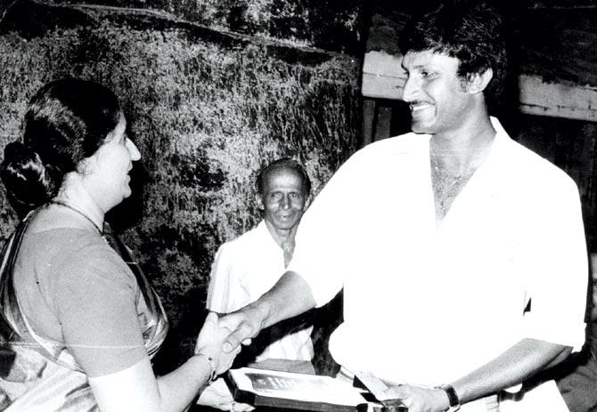 Sandeep Patil at a local cricket prize distribution function during his playing days . His coach Ankush 