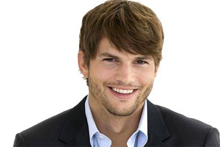 Ashton Kutcher loves being a father